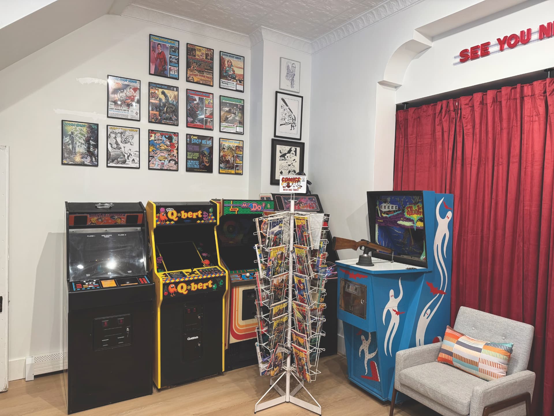 Arcade cabinets and framed CSN covers at CSN HQ